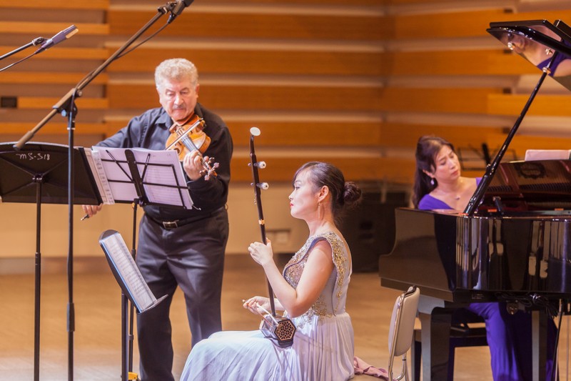 A fusion trio by Professor Vadim Mazo (violin), Ms Xing Lu (erhu) and Dr Cheng Wai (piano)